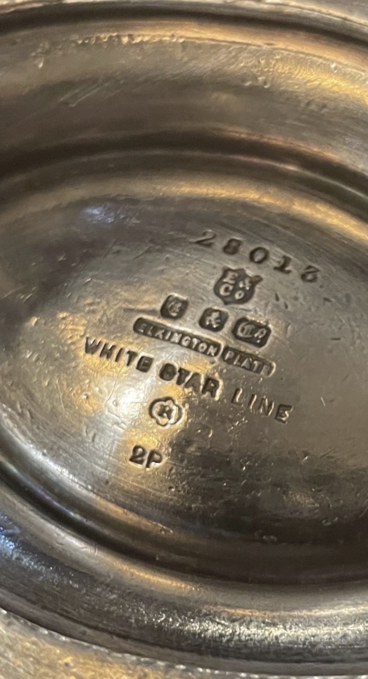 Base view showing full set of hallmarks, date codes, and any pattern or inventory stamps